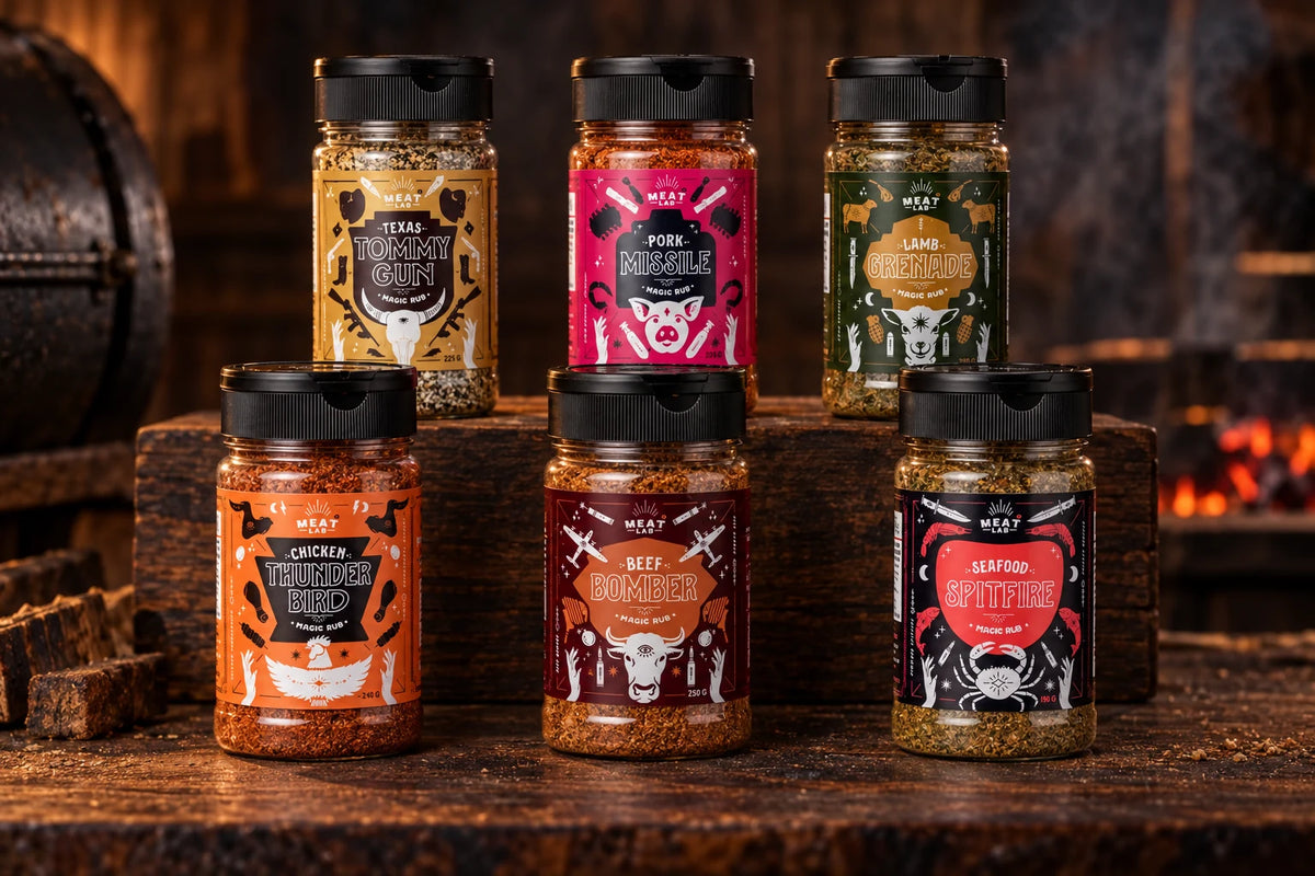 All six Meat Lab rub jars arranged on a timber barbecue workbench